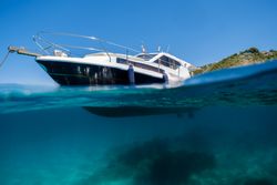 Yacht floating in blue sea