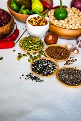 Bowls of dried seeds and legumes for meal