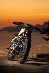 Motorbike near sea during sunset