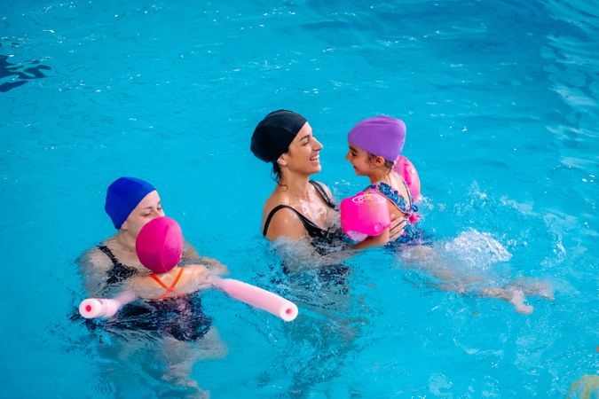 Women and girls in swimming pool
