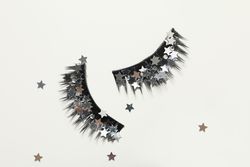 concept of cosmetology tools and beauty treatment, false eyelashes