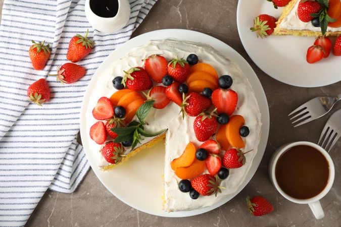 Composition with delicious berry cream cake. Tasty dessert