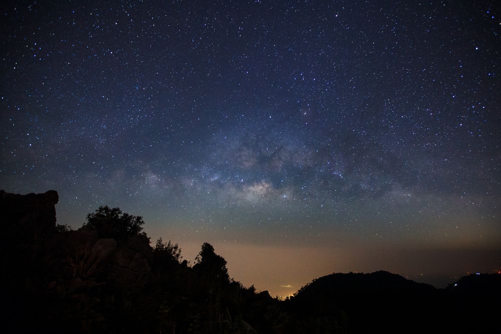 Milky Way Galaxy at Doi Luang Chiang Dao before sunrise. Long exposure photograph.With grain