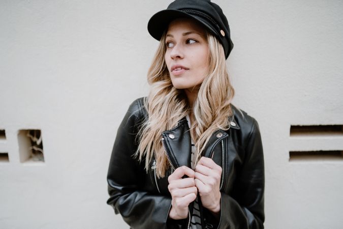 Stylish confident woman walking on the street