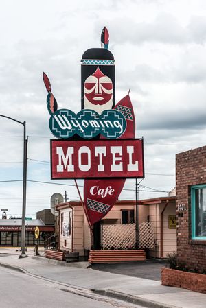 Roadside sign for the Wyoming Motel and Cafe, Cheyenne, Wyoming