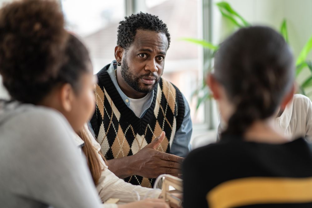 Male teacher leading science lessons