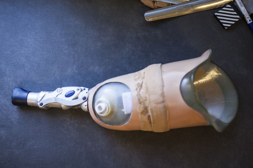 leg prosthesis on a desk of workshop