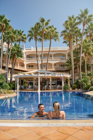 Loving couple in swimming pool