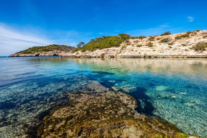 Cala Portinax bay with beautiful azure blue sea water