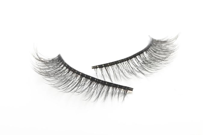 false eyelashes, isolated on light background