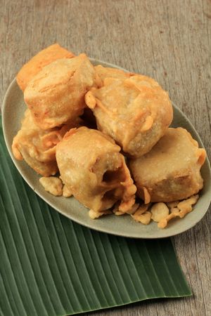 Plate of Indonesian fried stuffed tofu