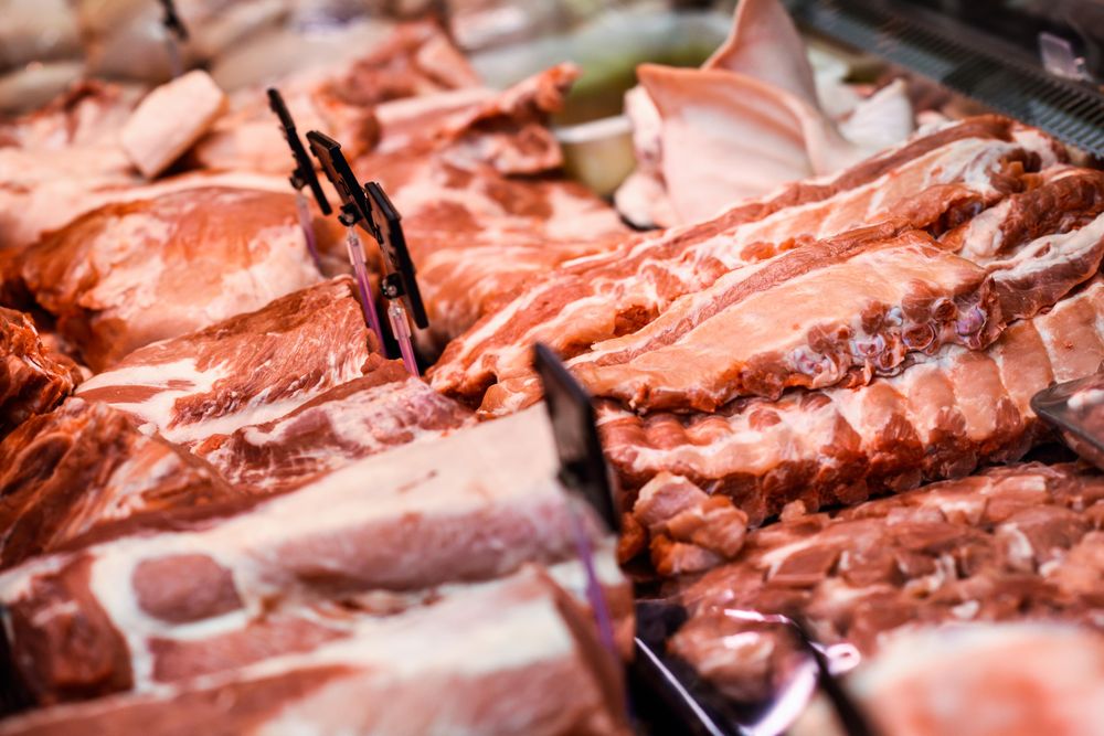 Close up of meat in display cabinet in butchers