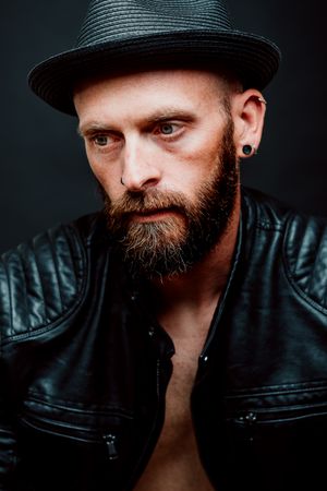 Young bearded guy in leather jacket