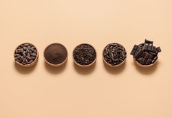 Cocoa and chocolate ingredients in bowls
