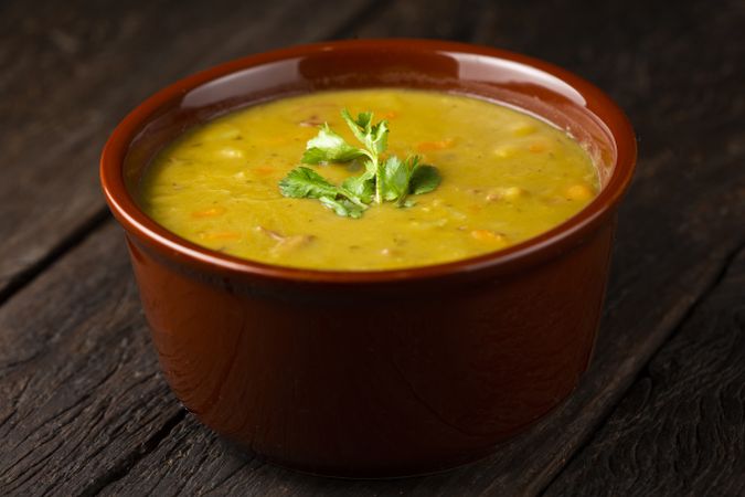 Pea soup. Bowl with pea soup on the table