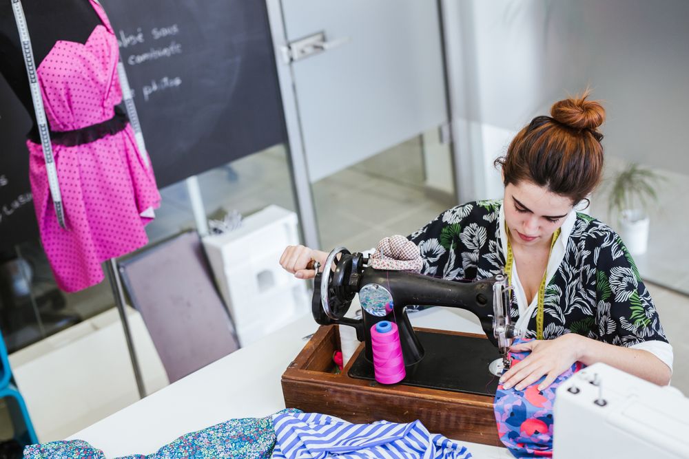 Woman in a sewing school