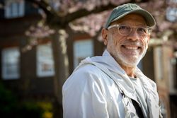 Portrait of smiling male with grey beard in the spring