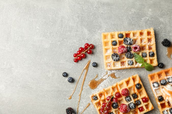 Flat lay composition with sweet belgian waffles, space for text