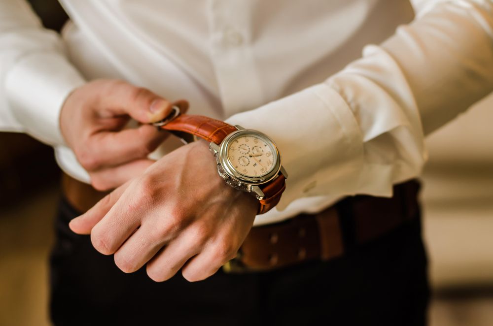 Man in dress shirt wearing watch