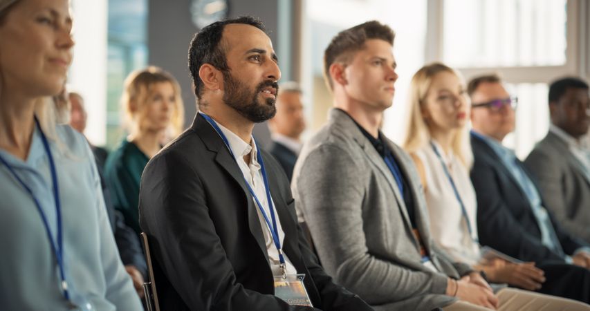 Middle Eastern Man Looking For Investment Opportunities At International Tech Forum