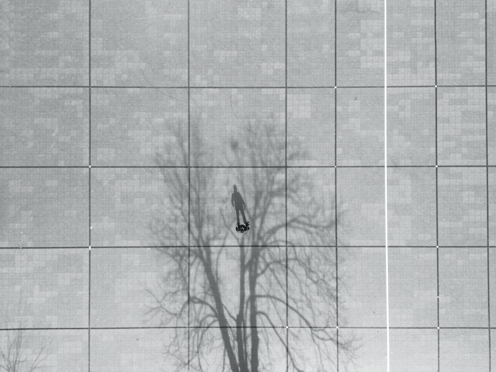 Aerial view of a man standing strong