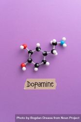 Dopamine molecular structure over purple background 0WkRy0