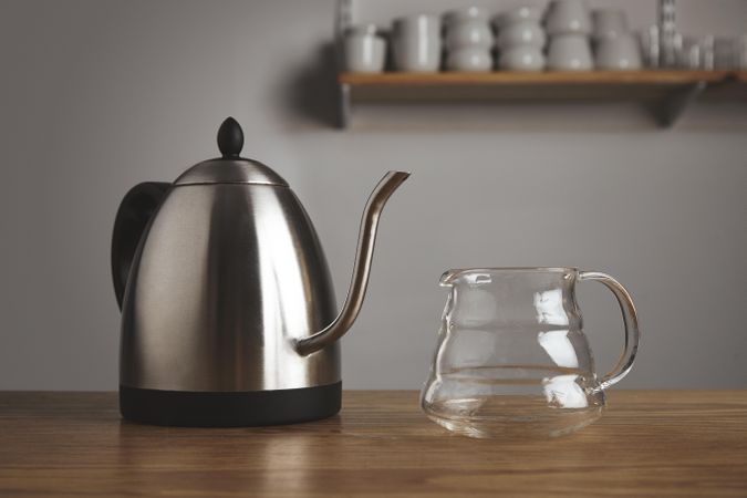 Kettle for pour over coffee on wooden table