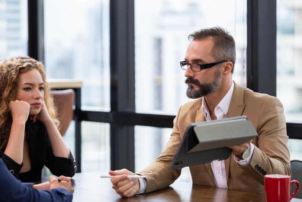 Serious colleagues having meeting in office together