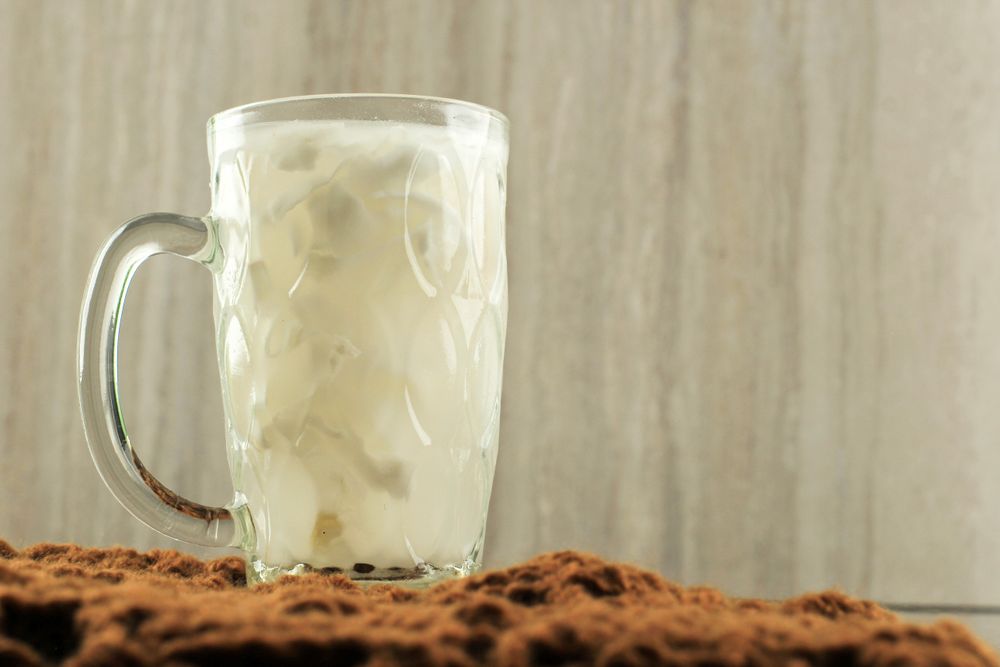 Refreshing summer coconut drink with space for text