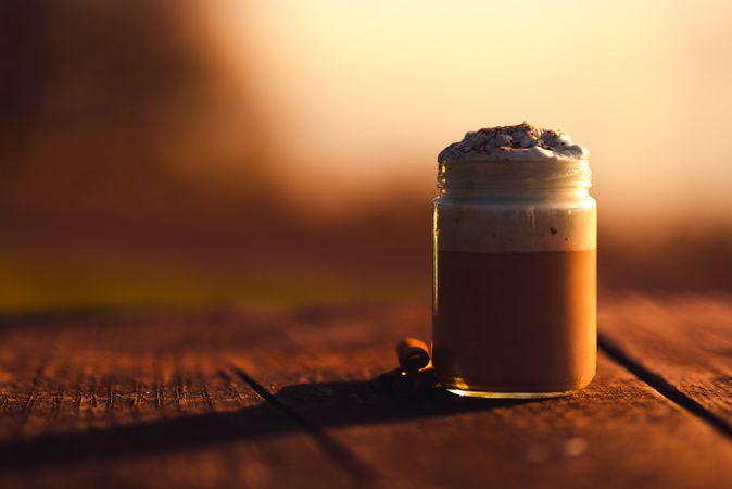 Cinnamon near coffee on table