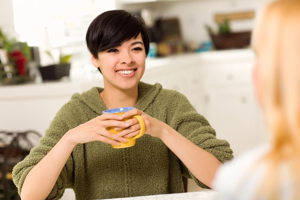 Young Woman Socializing with Friend