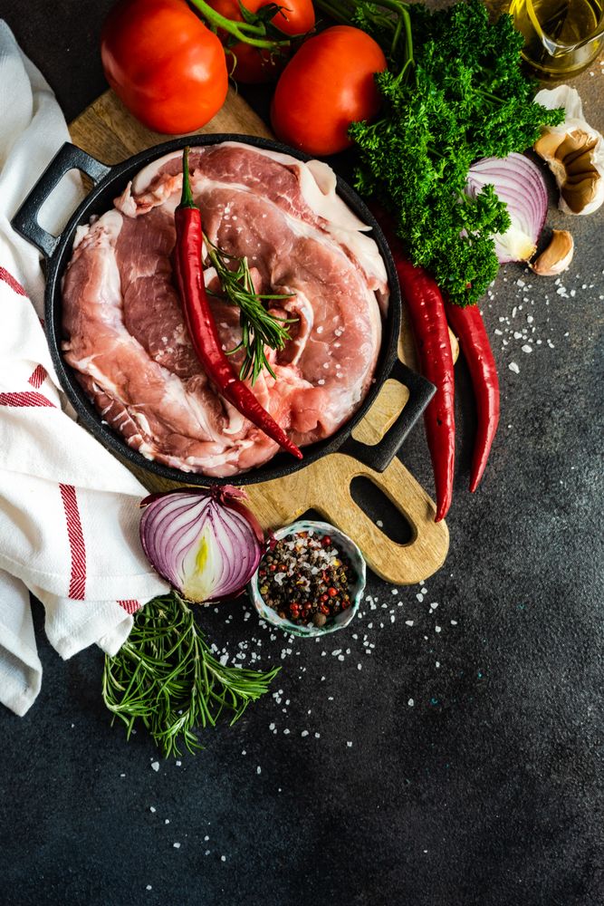 Top view of fresh raw pork ready to be cooked for dinner
