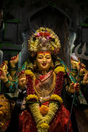 A beautiful idol of Maa Durga being worshipped at a pandal during Navratri in Mumbai, India