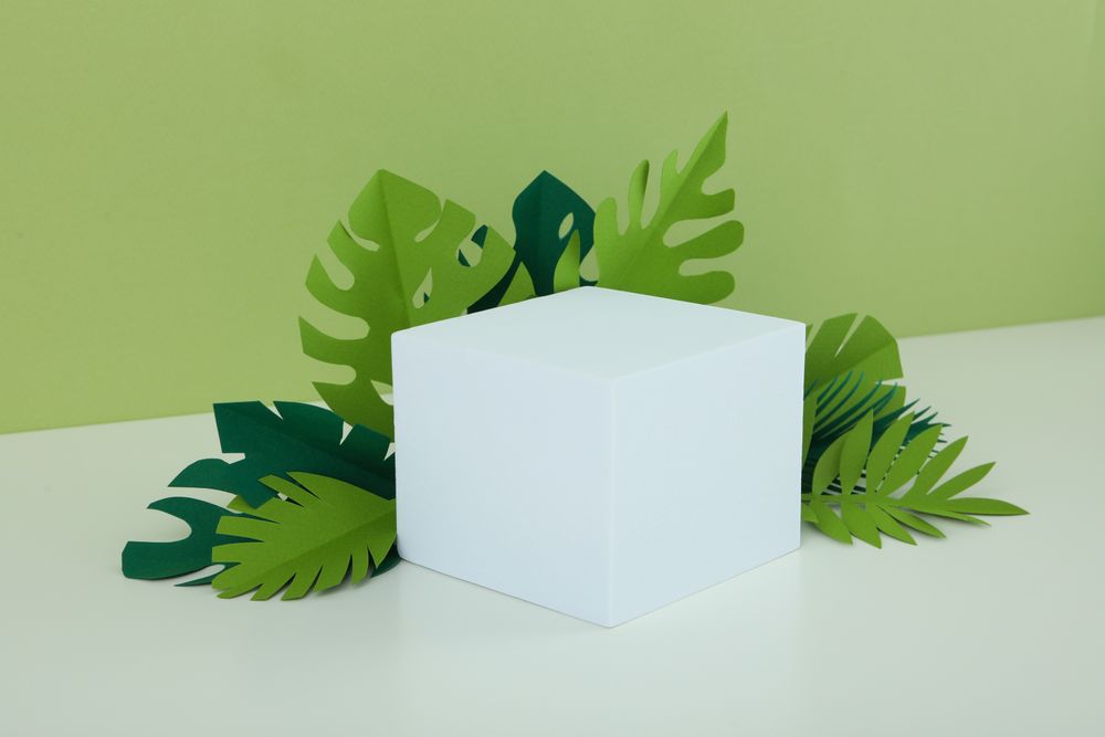 Square podium surrounded by foliage
