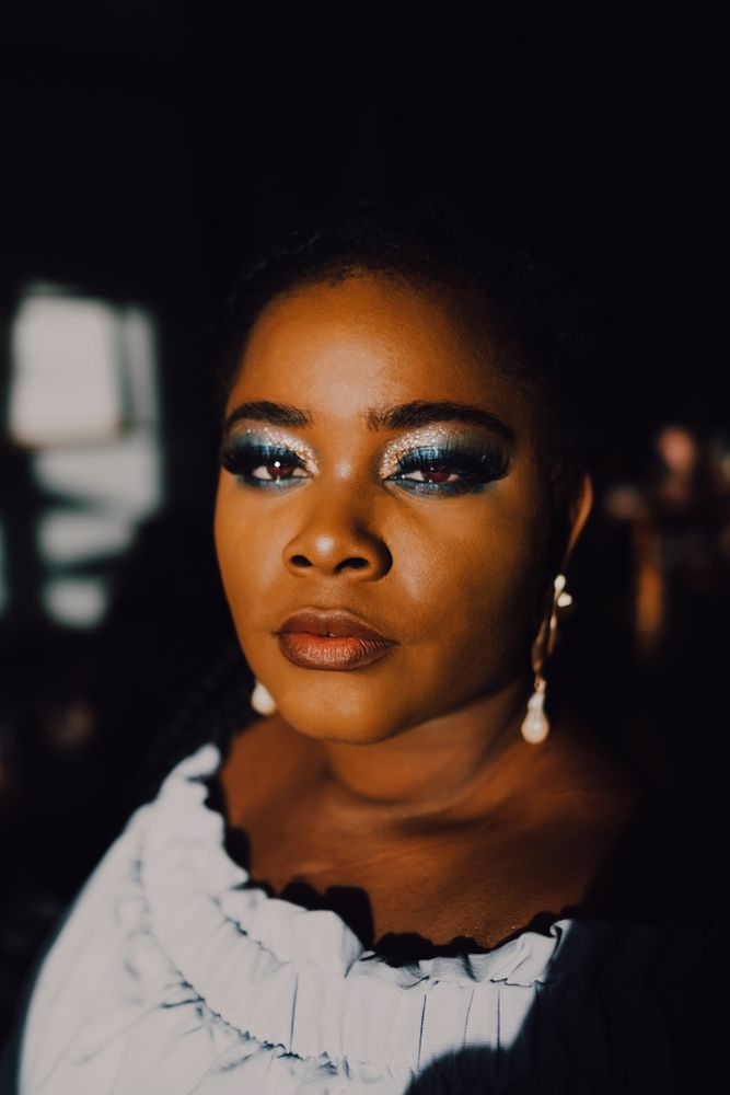 Headshot of confident trendy Black woman