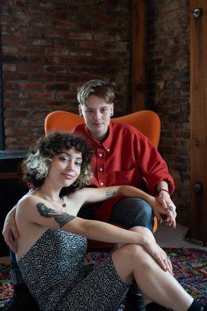 Portrait of young couple in urban loft