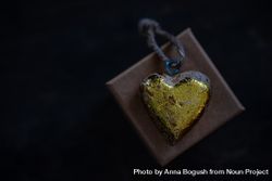 Valentine's day concept with golden heart ornament 4d887r