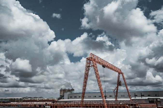 Crane under cloudy sky
