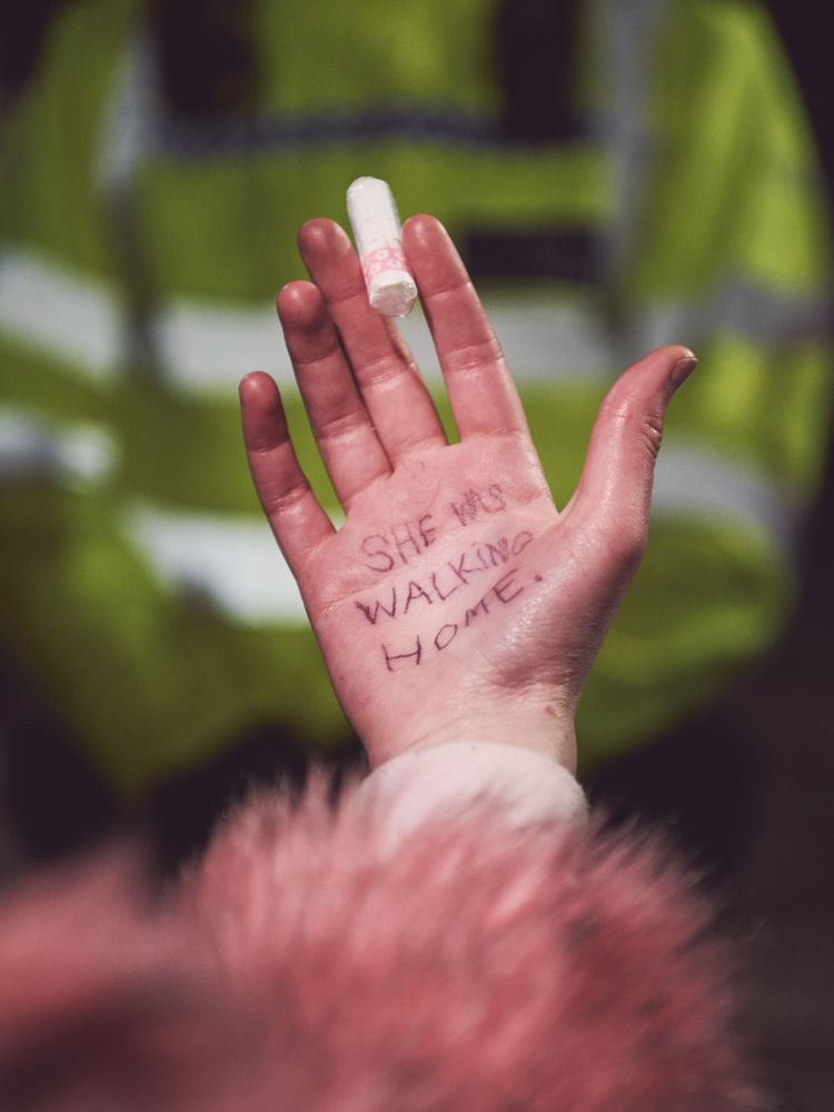 London, England, United Kingdom - March 16, 2021: Palm of hand with “She was walking home”