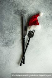 Christmas table setting with Santa hat on fork 4ALAz5