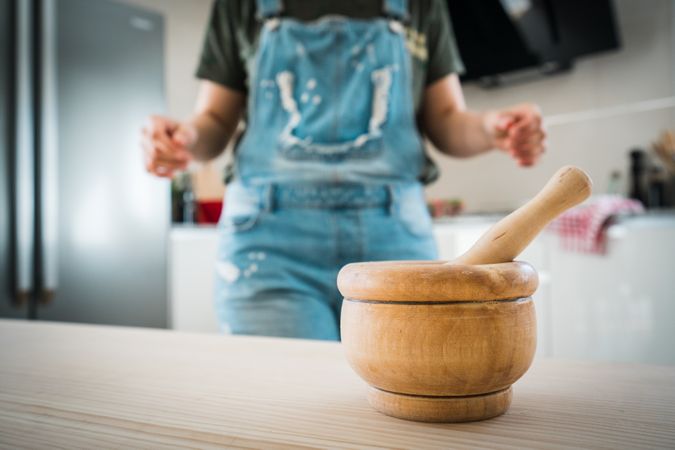 Mortar and pestle on table in kitchen
