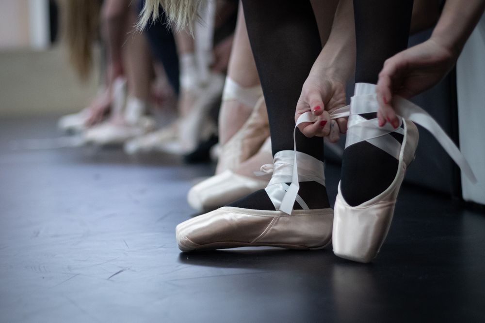 Line of ballerinas in shoes