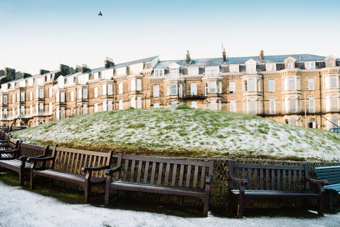 Benches and hoarfrost grass in town