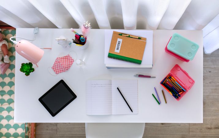 Top view of desk in girl's bedroom