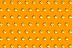 Pattern of floating orange square  balloons with dripping paint on orange background