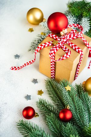 Marble counter with Christmas present wrapped with red string