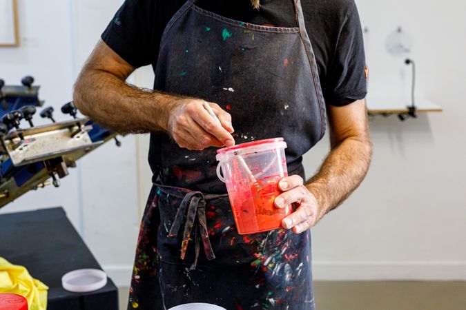 male artist preparing paints