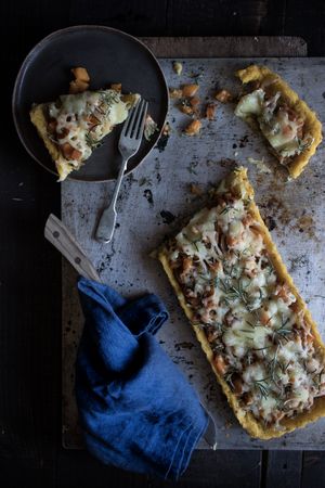 Delicious pumpkin cake on tray near plate