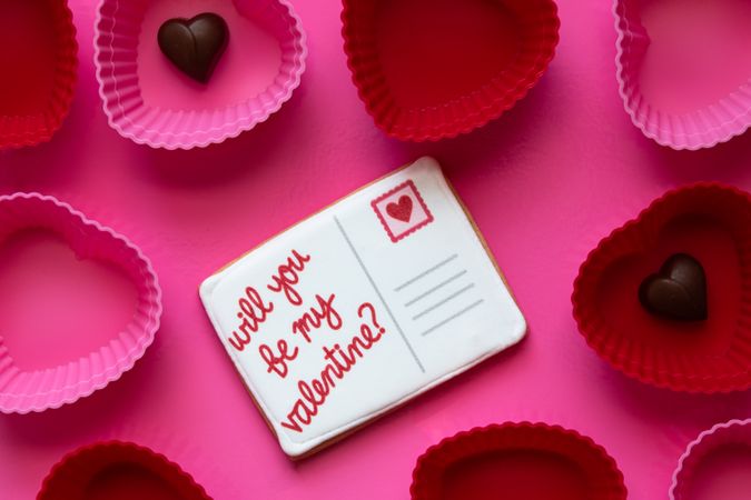 Valentine's Day- Love message on a cookie. Flat lay.