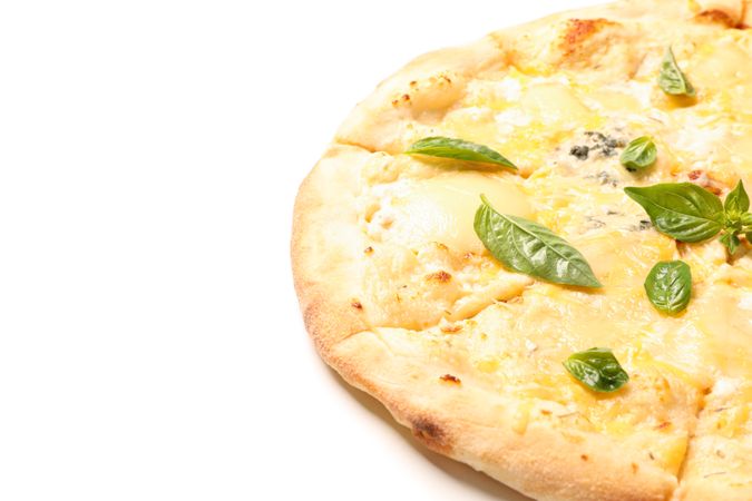 Cheese pizza with basil isolated on blank background, close up